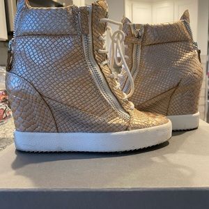 Gold ( snake skin) used heeled sneaker style shoes. Good condition and authentic